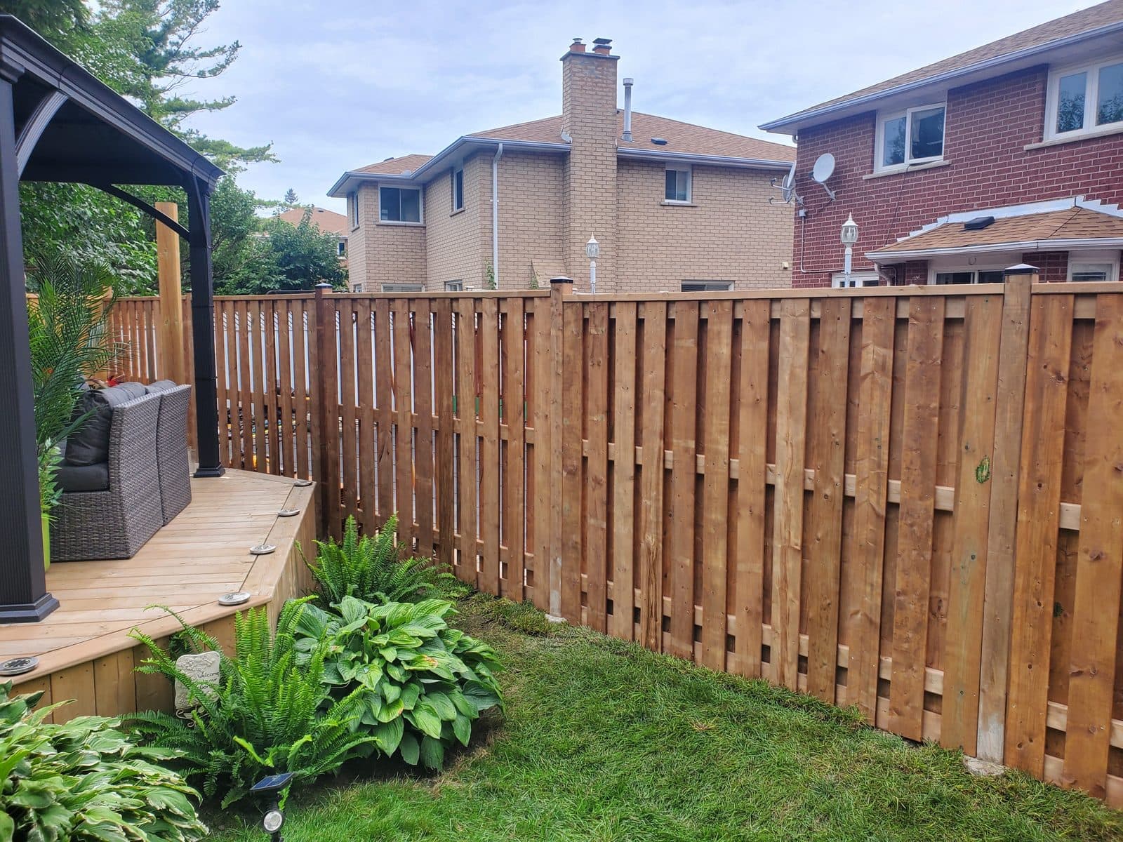 Wood privacy fence installed by FILD Group