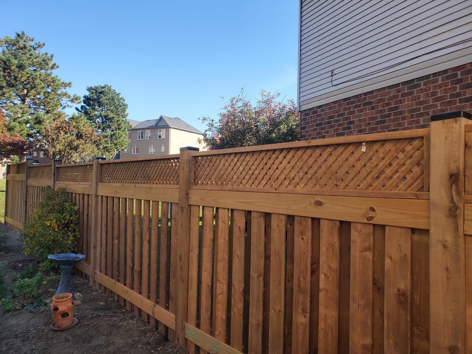 Wood privacy fence installed by FILD Group