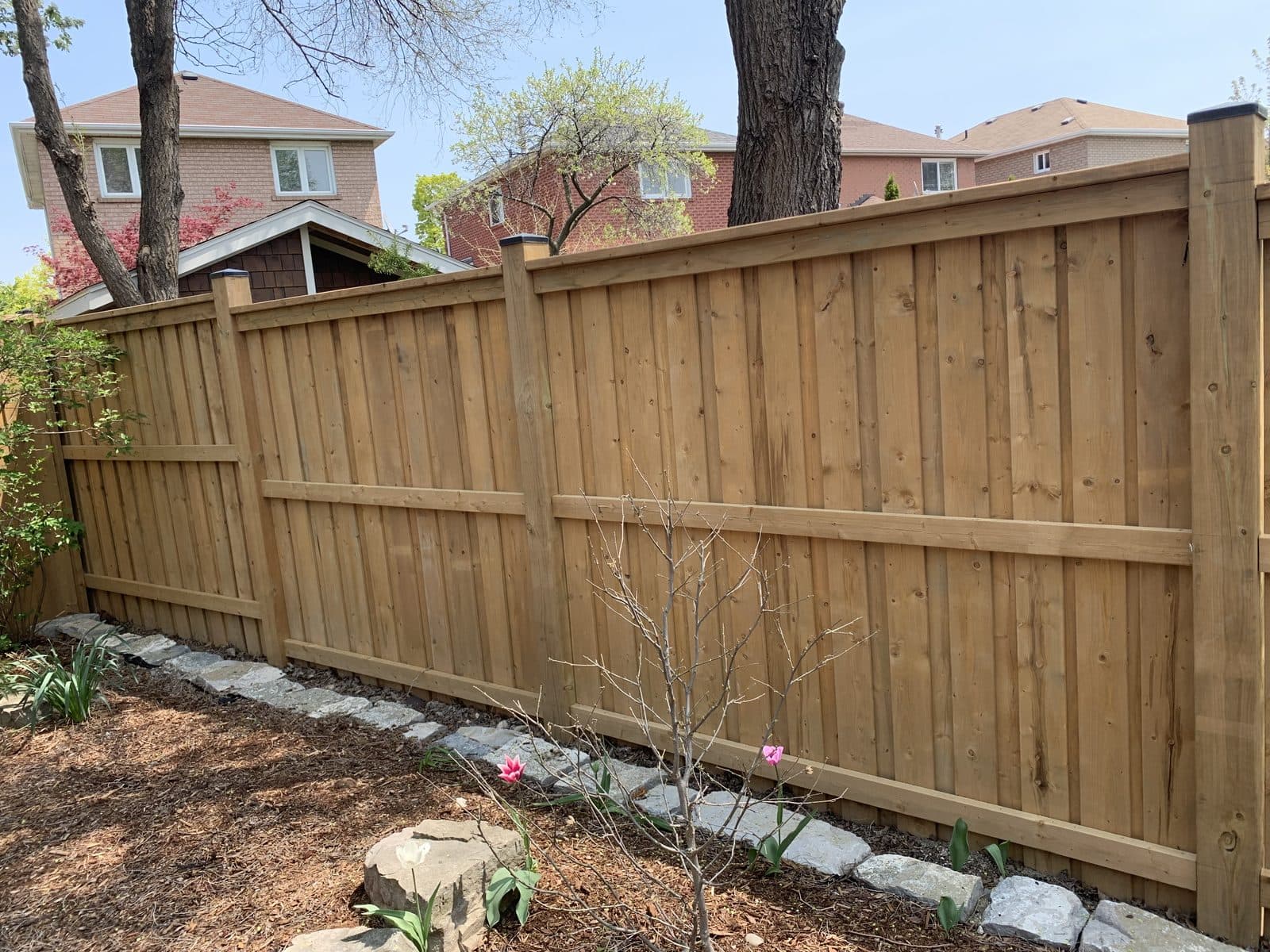 Wood privacy fence installed by FILD Group