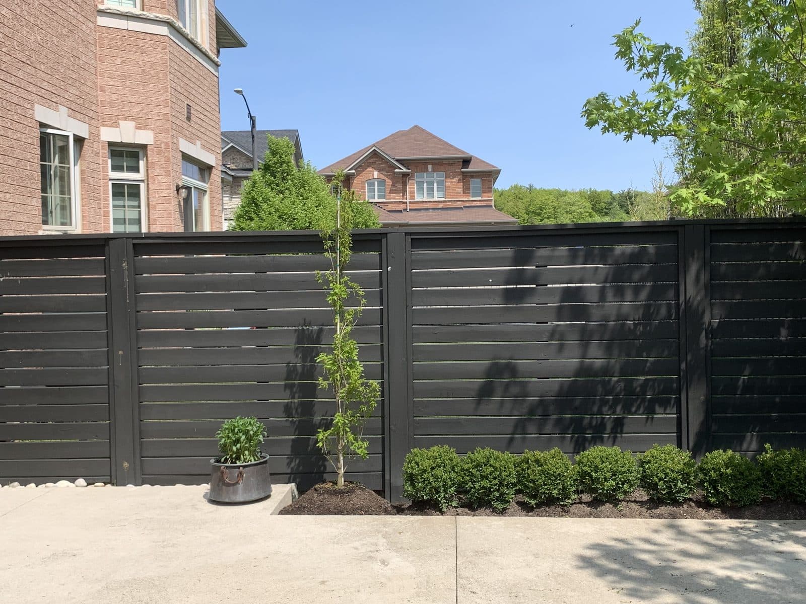 Wood privacy fence installed by FILD Group