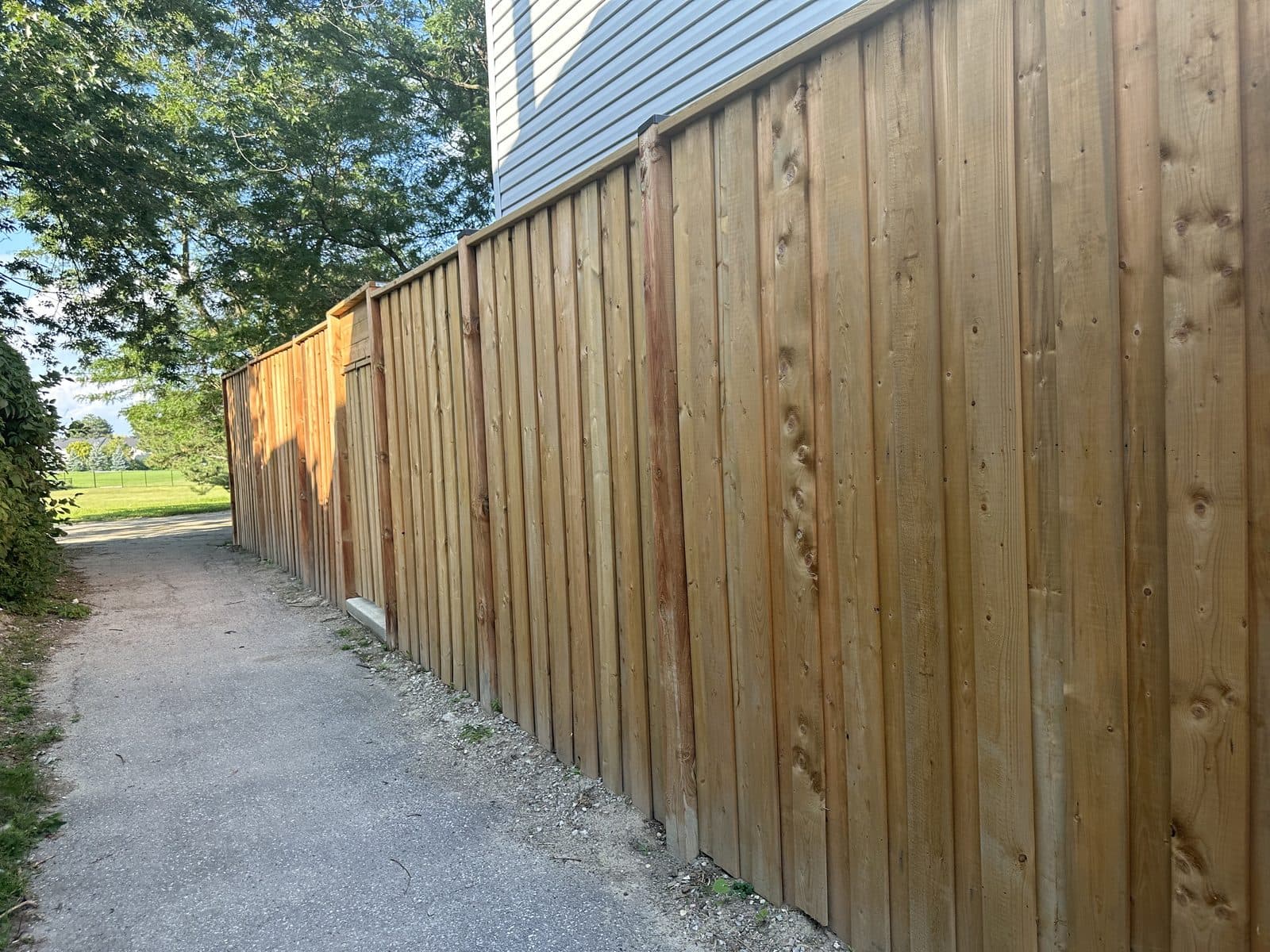 Wood privacy fence installed by FILD Group