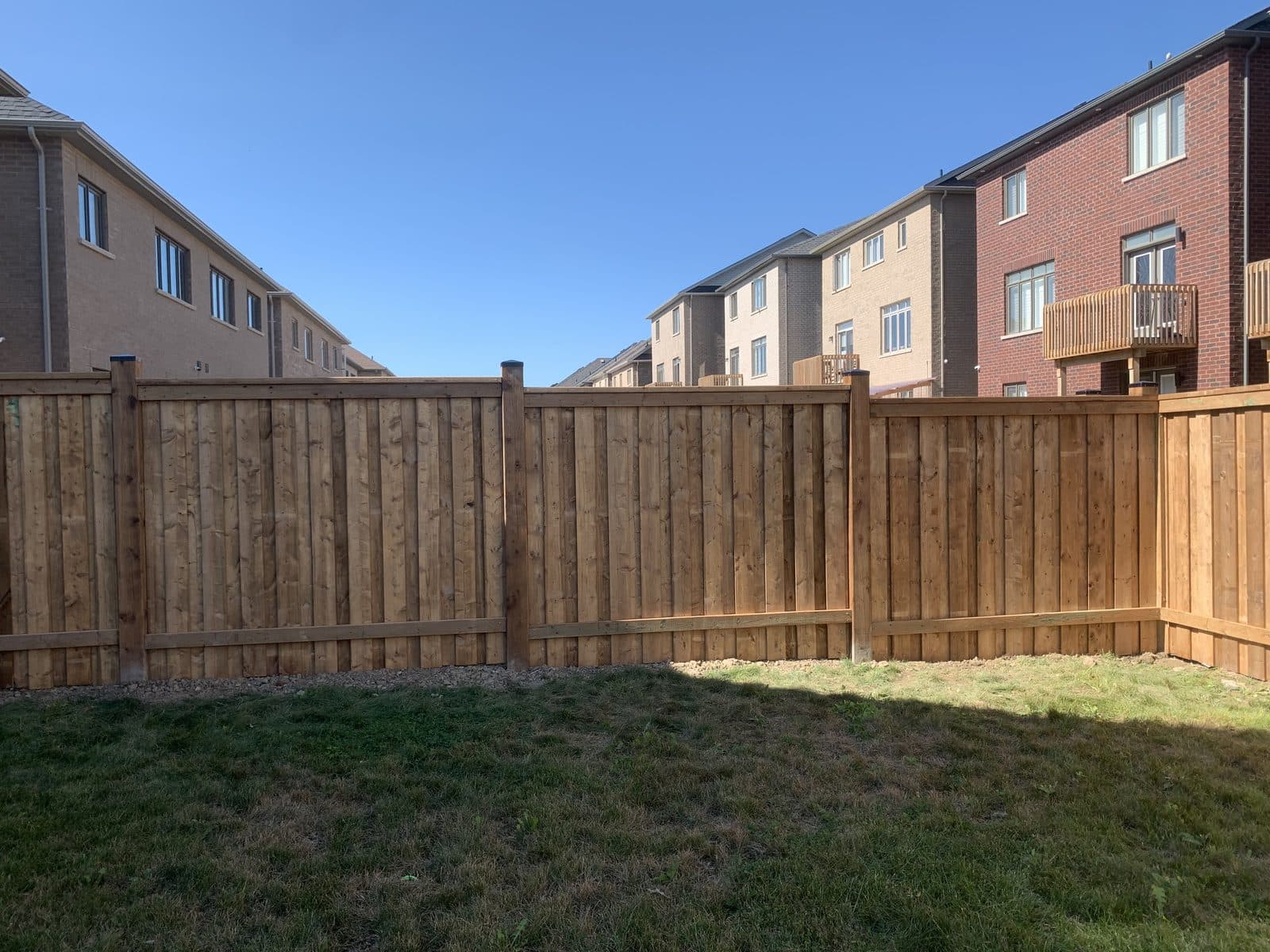 Wood privacy fence installed by FILD Group