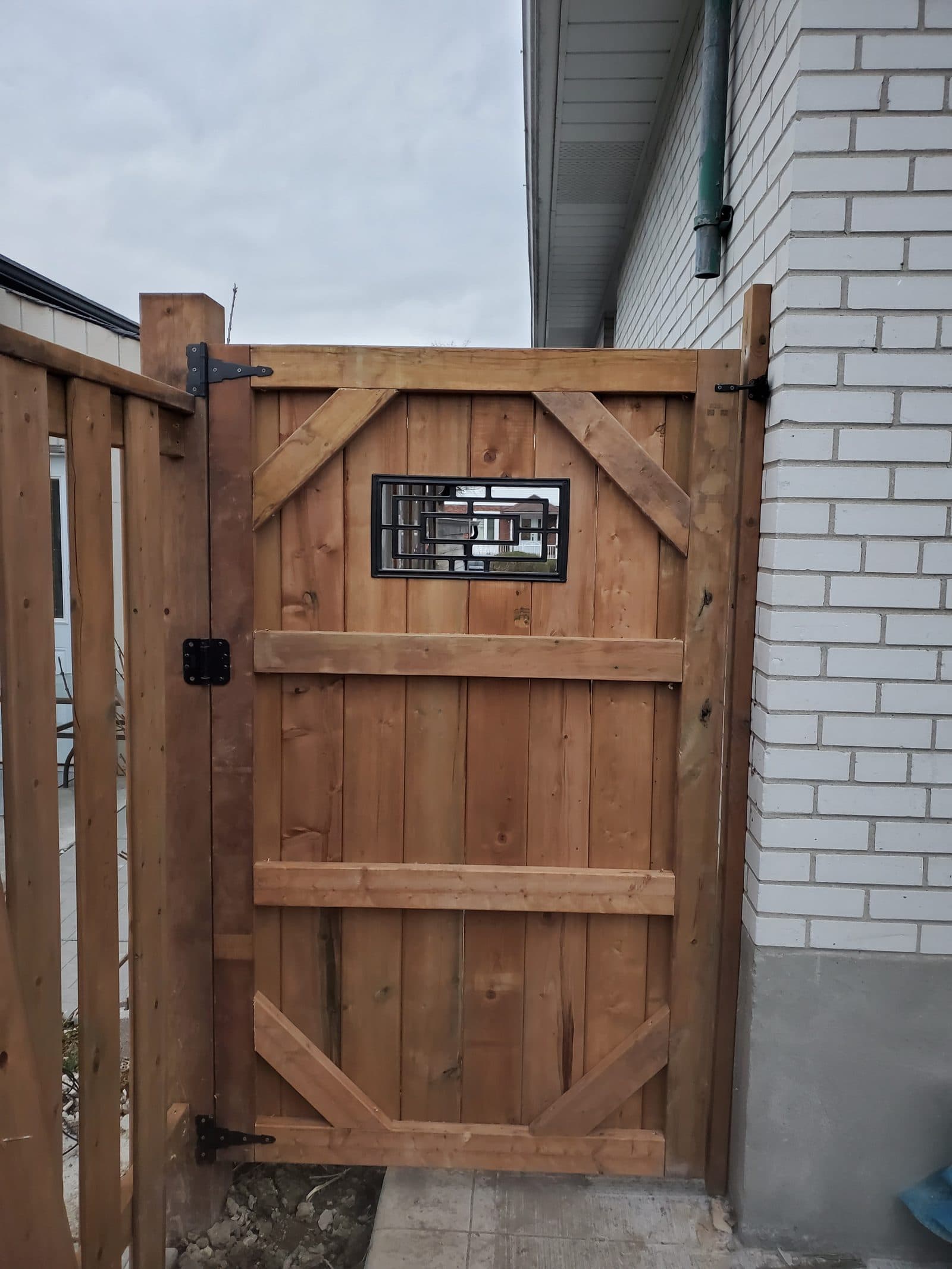 Custom fence gate built by FILD Group
